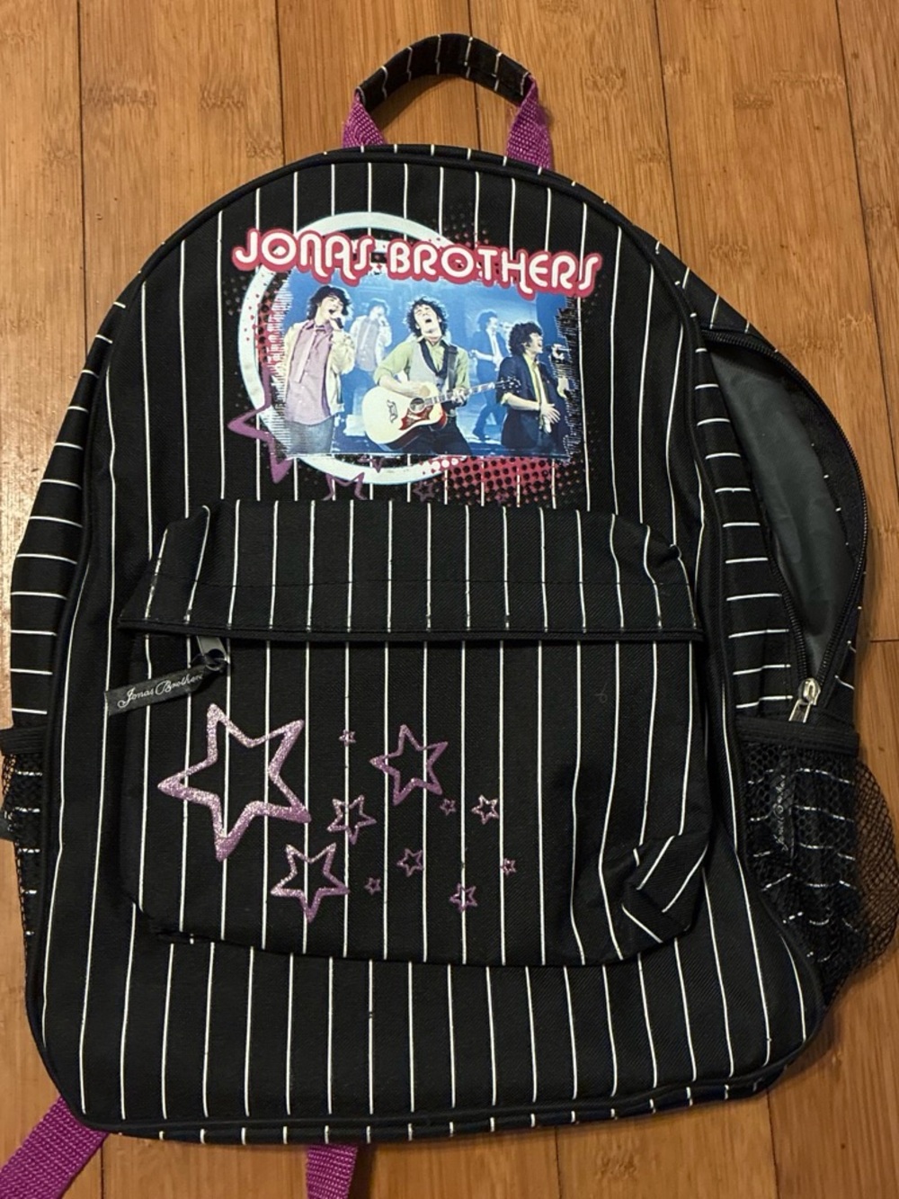 2008 Jonas brother Disney Black Pinstripe Backpack with Purple Star Accents